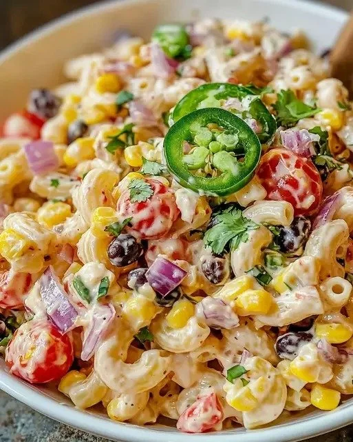 Colorful Easy Mexican Pasta Salad with fresh vegetables and spices