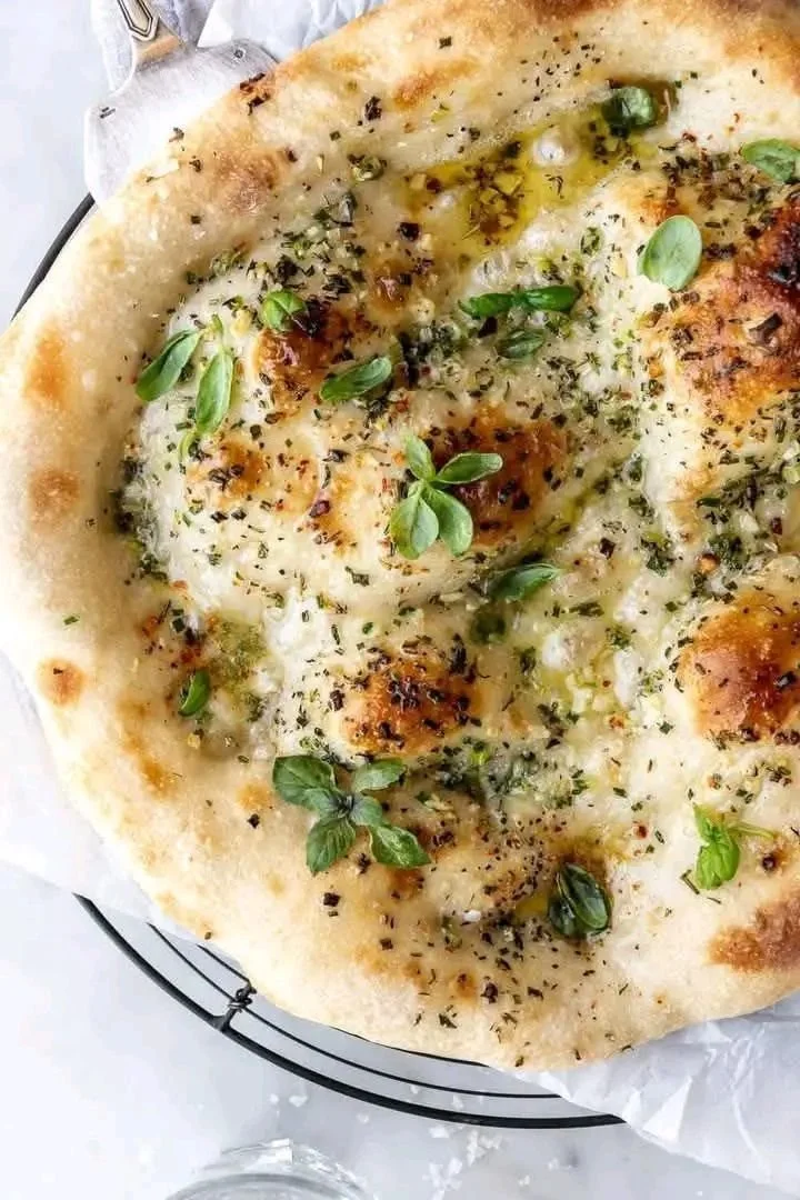 Delicious Garlic Butter Pizza topped with fresh ingredients and melted cheese