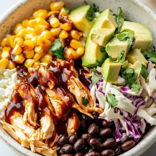 Delicious grilled BBQ chicken served in a cottage cheese bowl with fresh veggies
