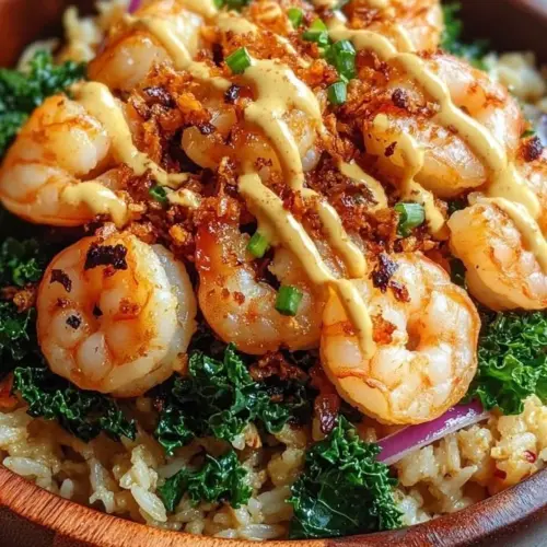 Delicious spicy garlic shrimp fried rice served in a bowl with herbs